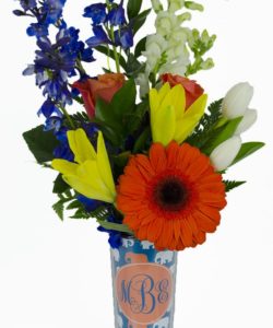 Send a personalized gift with this tall travel mug. Send alone or let our designers fill it with flowers to complement your custom look.